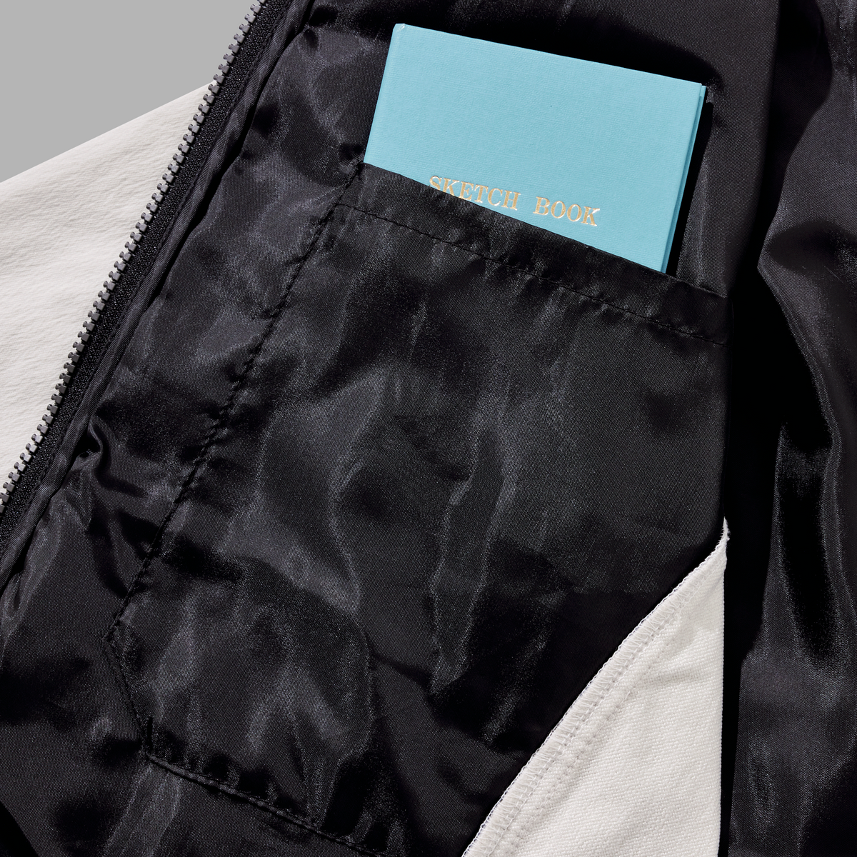 23AW402  インサレーションテックライトパテッドブルゾン